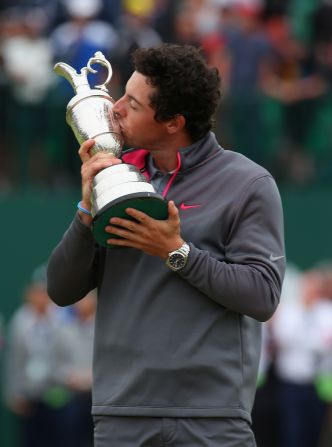 Rory McIlroy gets up close and personal with The Claret Jug as he savors his maiden British Open triumph.