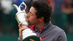 Rory McIlroy gets up close and personal with The Claret Jug as he savors his maiden British Open triumph.