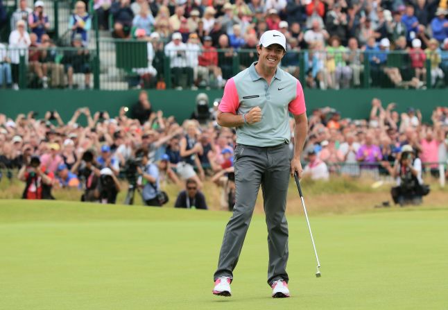 McIlroy sinks the winning putt on the 18th at Hoylake to seal his two-shot triumph at the British Open.