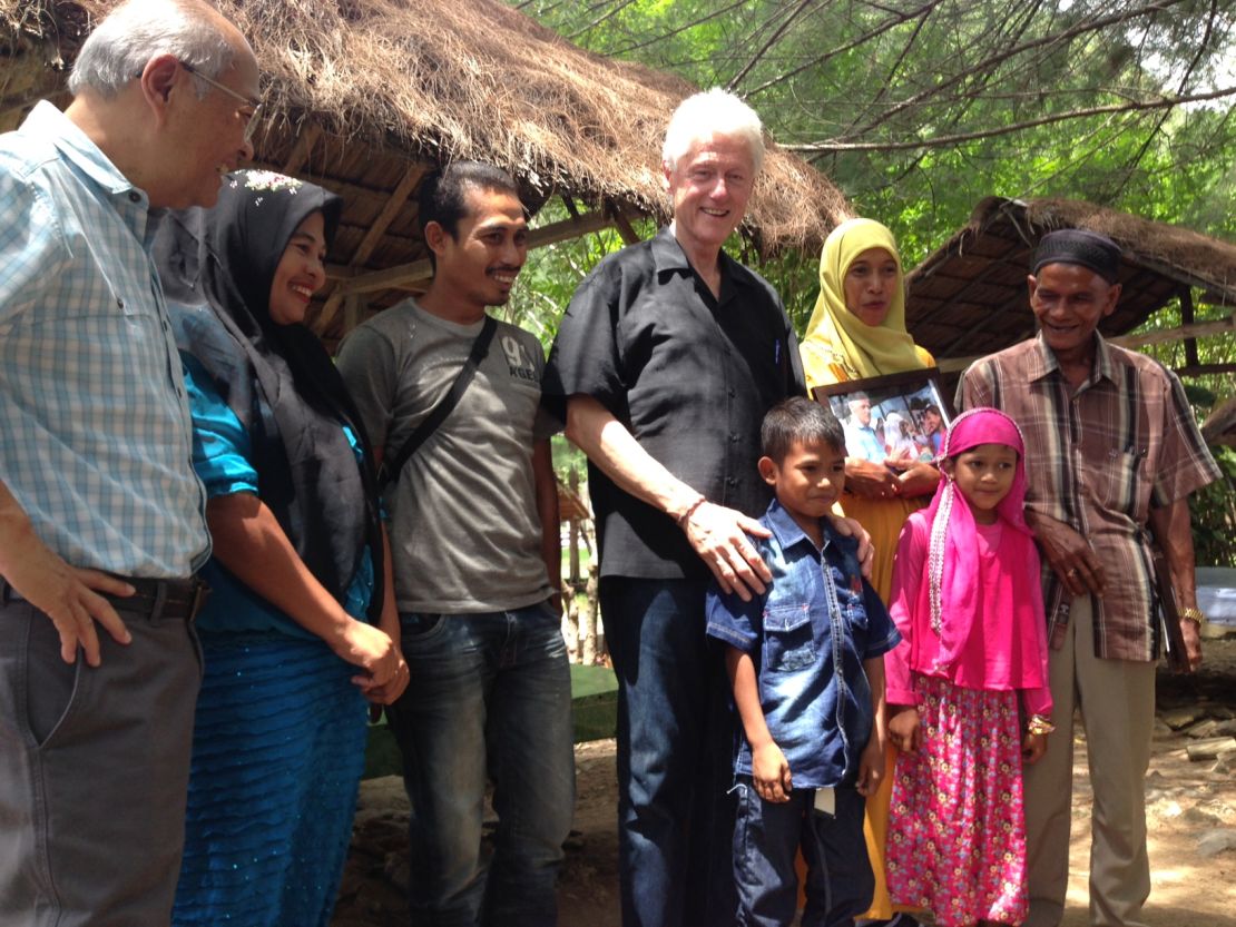 Clinton visits a mosque in Banda Aceh, Indonesia during his Southeast Asia tour.