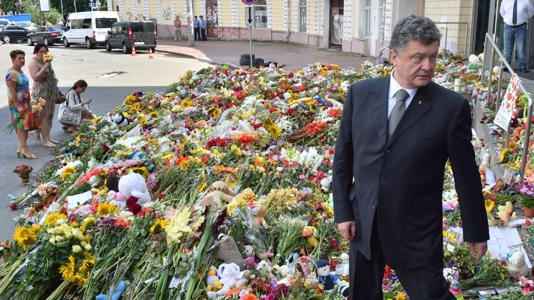 Ukrainian President Petro Poroshenko attends a flower-laying ceremony at the Dutch Embassy in Kiev, Ukraine, on July 21. Although the passengers came from all over the world, many of them were Dutch because the flight originated in Amsterdam.