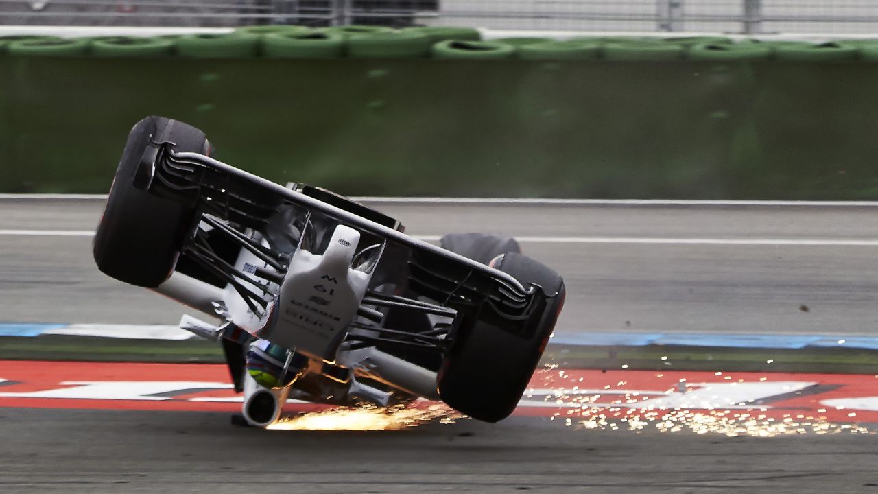 Formula One driver Felipe Massa crashes Sunday, July 20, during the opening lap of the German Grand Prix in Hockenheim, Germany. Massa wasn't hurt in the crash, which occurred after his car was clipped from behind. 