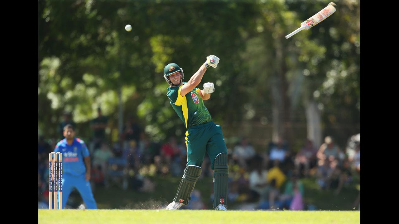 A cricket bat slips from the hands of Australia's Mitchell Marsh during a Quadrangular One Day Series match against India on Sunday, July 20.