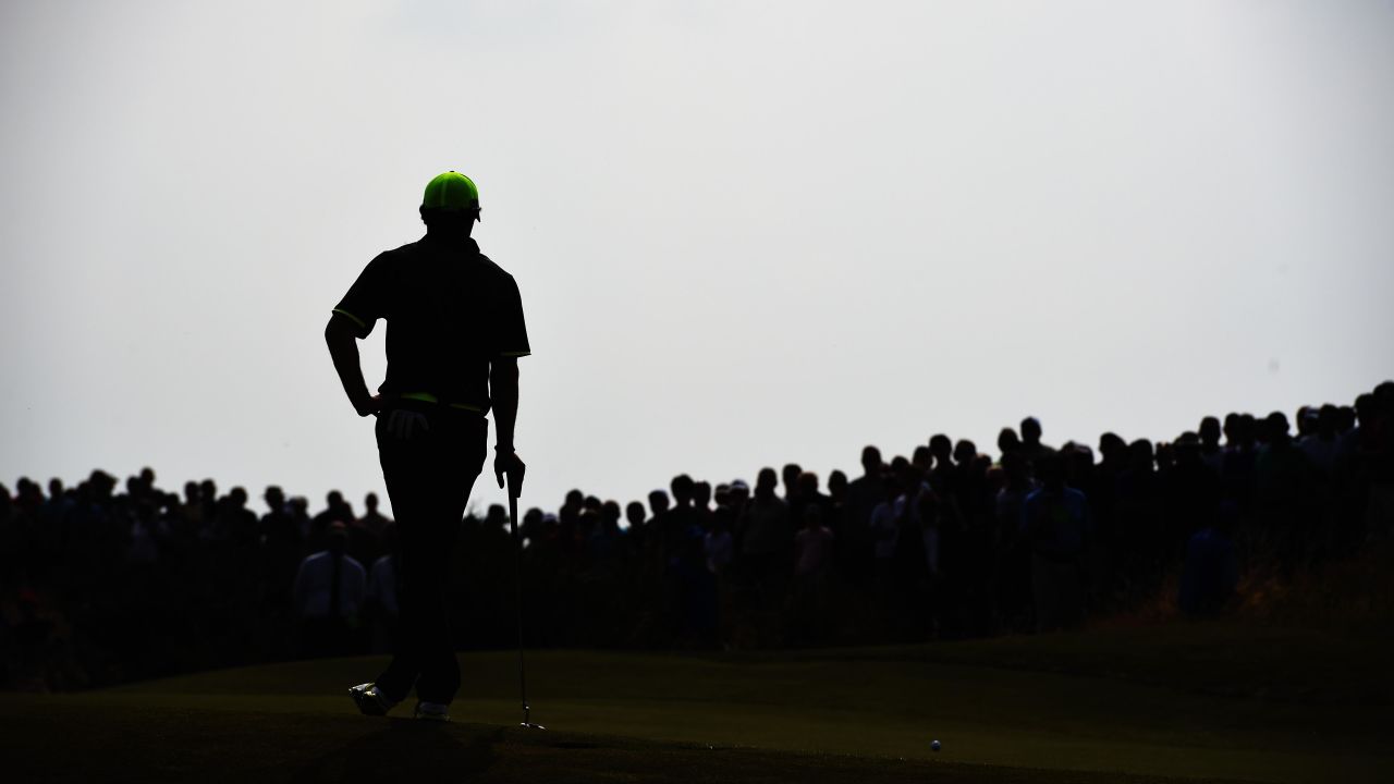 Rory McIlroy waits on the sixth green of the Royal Liverpool Golf Club during the second round of the British Open on Friday, July 18. McIlroy won the tournament by two strokes, becoming only the third golfer to win three majors before his 26th birthday. The other two golfers? Jack Nicklaus and Tiger Woods.