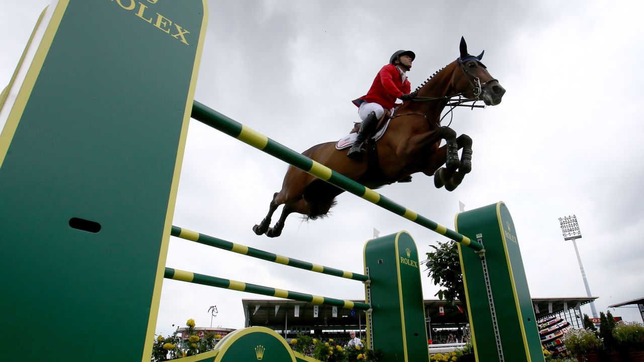 Kent Farrington rides on Voyeur, finishing second in the Rolex Grand Prix jumping competition that was held Sunday, July 20, at the CHIO Aachen horse show in Aachen, Germany.