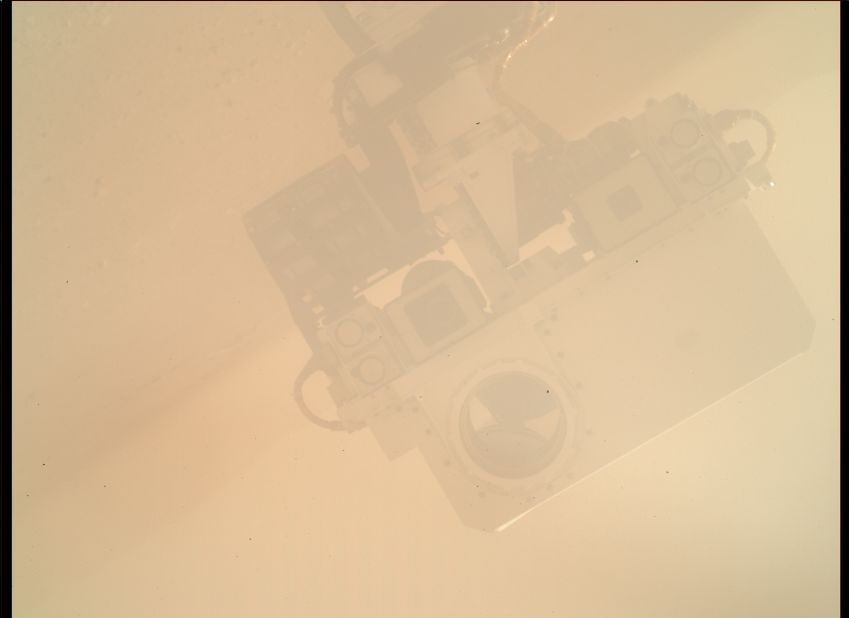 This was the<a href="http://mars.jpl.nasa.gov/msl/multimedia/raw/?rawid=0032MH0243000000C0_DXXX&s=32" target="_blank" target="_blank"> first attempt at a selfie Curiosity</a> made back on September 8, 2012. In this upside down Wall-E-esque snap, the sandy surroundings were captured by the rover utilizing its Mars Hand Lens Imager, found at the end of its turret arm. To see the rest of the tech onboard Curiosity,<a href="https://www.cnn.com/2014/07/01/tech/innovation/mars-curiosity-take-a-look/index.html" target="_blank"> explore this interactive. </a>