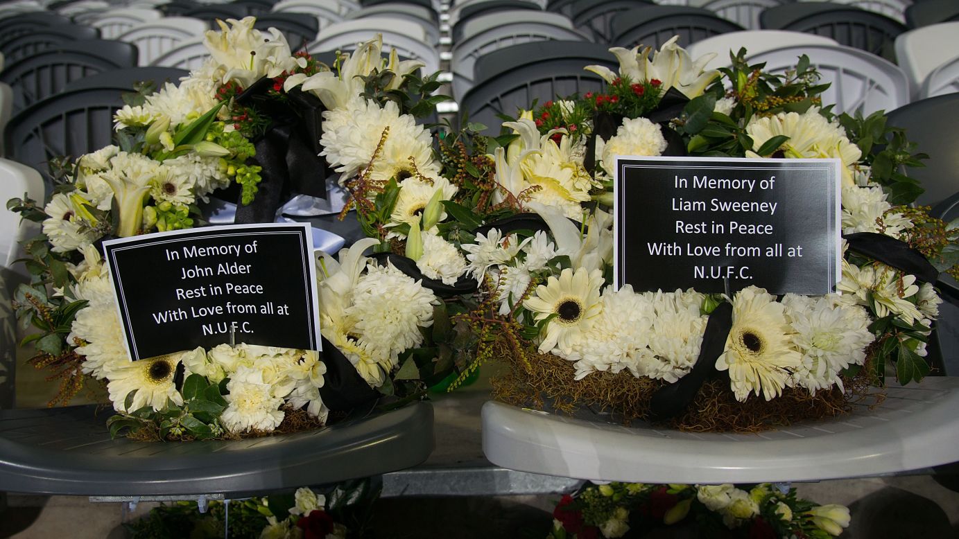 In memory of two Newcastle United fans who died in the crash, two wreaths are placed on seats July 22 at the Forsyth Barr Stadium in Dunedin, New Zealand. The soccer fans were traveling to New Zealand to watch their team play in a preseason tournament.