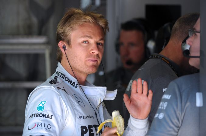Formula One drivers cannot survive on bananas alone -- but they do make a handy garage snack, as Mercedes driver Nico Rosberg shows.