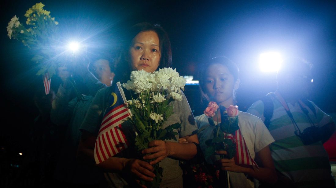 Families of crew members aboard Malaysia Airlines Flight 17 gather for a vigil Tuesday, July 22, in Kuala Lumpur, Malaysia. All 298 people aboard the passenger plane died when it was shot down Thursday, July 17, in a rebel-controlled part of eastern Ukraine.