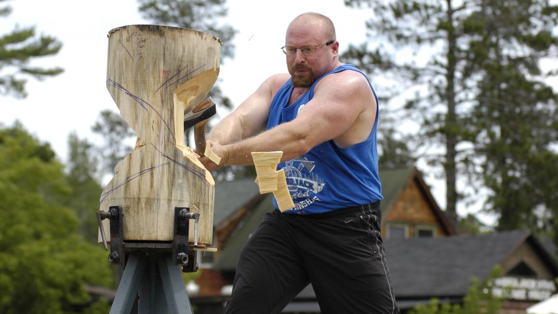 In the standing block chop, the lumberjack must cut through 12 to 14 inches of a vertical log.  