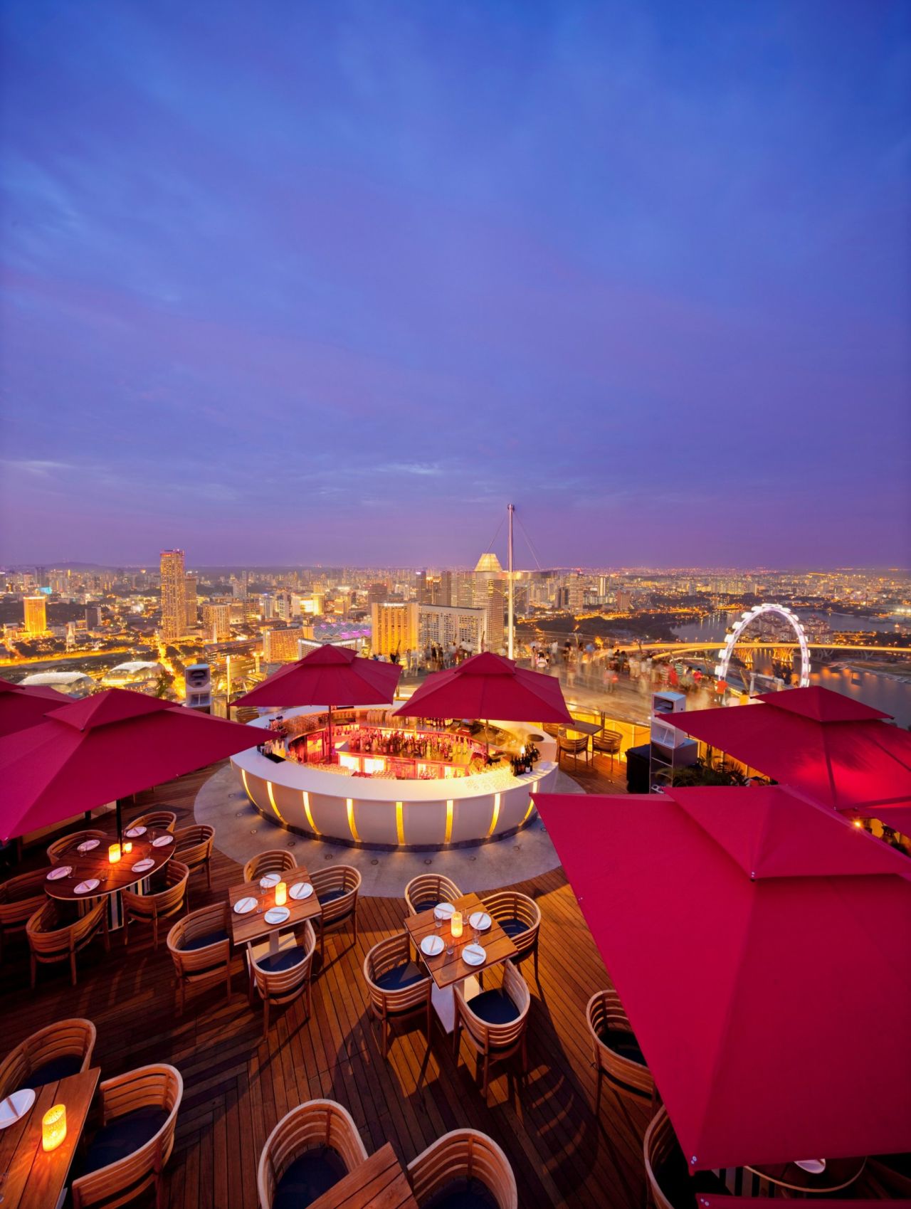 Singapore's Sky Bar at KU DE TA has spectacular views into the city and of Marina Bay Sands' famous infinity pool. Arrive at sunset to reap the full experience. 