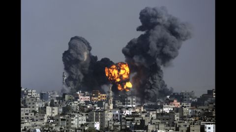 Smoke and fire from the explosion of an Israeli strike rise over Gaza City on July 22. 