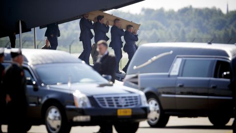 Military personnel in Eindhoven carry a coffin July 23 that holds one of the victims.