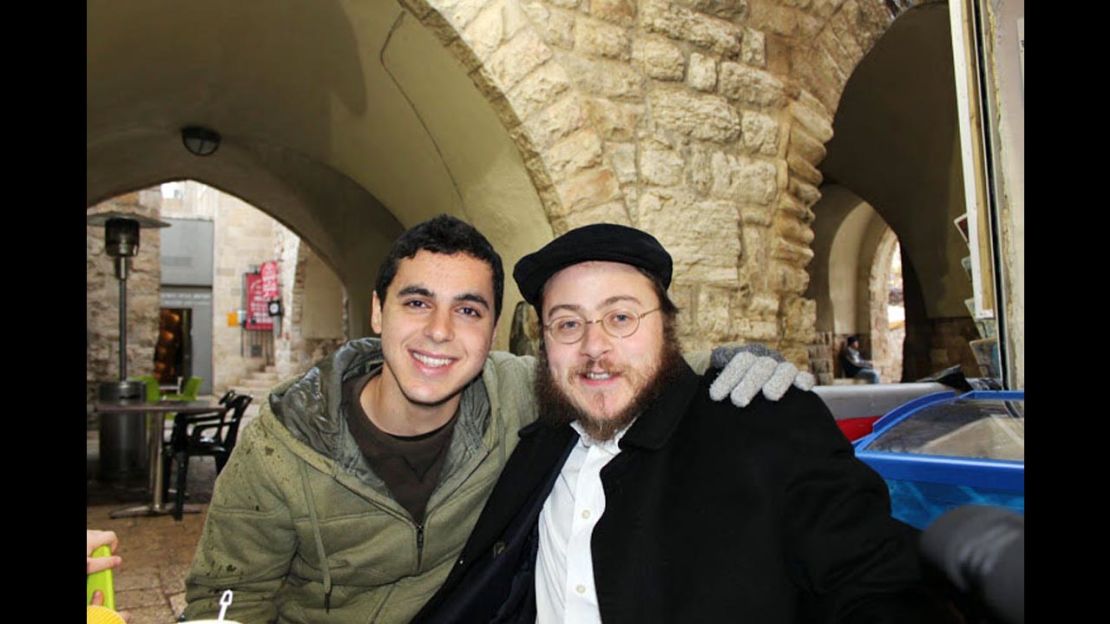 Sean Carmeli poses with Rabbi Asher Hecht in Jerusalem in 2012. His funeral was Monday night in the Israeli city of Haifa.