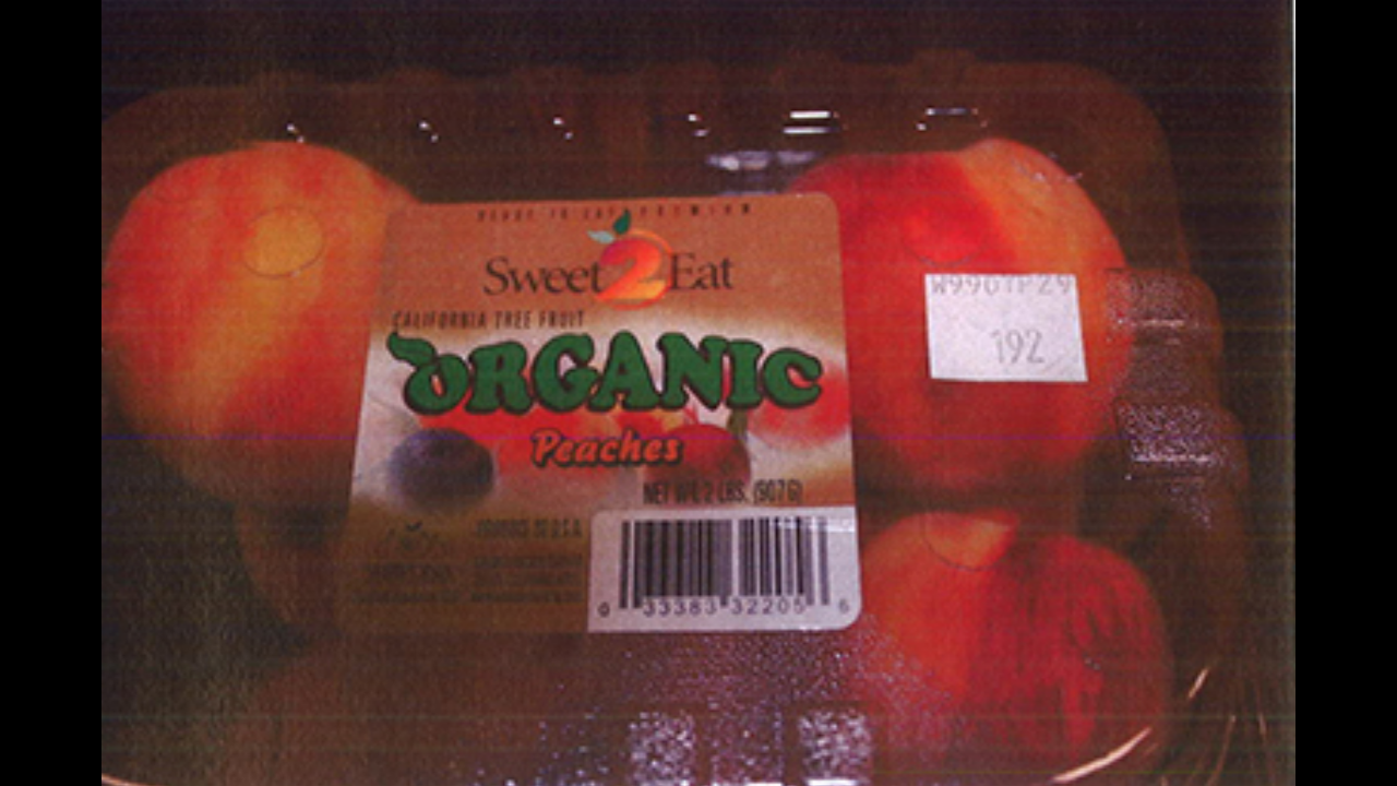 Costco organic peaches in clamshell packaging (2 lbs./8 per carton)