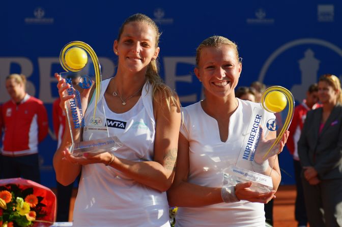 After struggling with her health in recent years, the Dutch player has had more success in doubles, winning six titles on the WTA Tour. Here she celebrates with Karolina Pliskova (left) after their success in Nuremberg in May.
