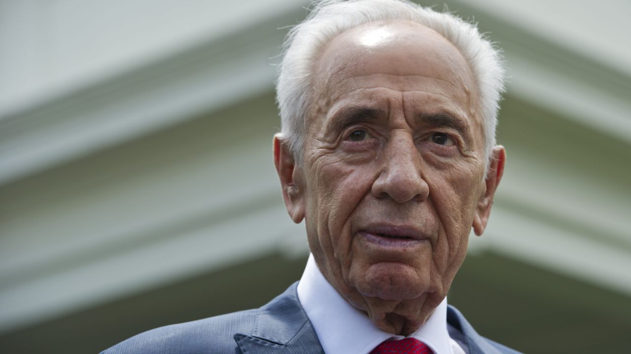 Israeli President Shimon Peres speaks to reporters outside of the West Wing after meeting with US President Barack Obama at the White House on June 25, 2014, in Washington. 