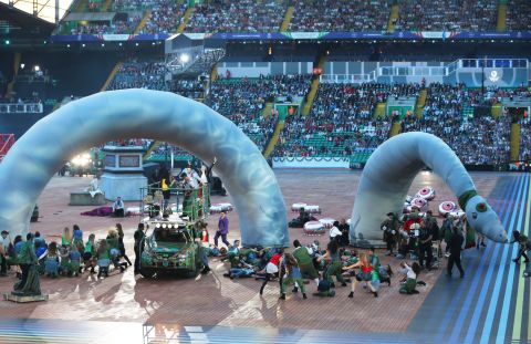 A huge stuffed version of Scotland's famed Loch Ness Monster curled around the stage.