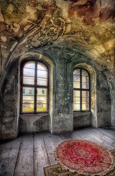 This image of two windows under a vaulted ceiling veined with decay is enigmatically titled "Ethereal Dreams."