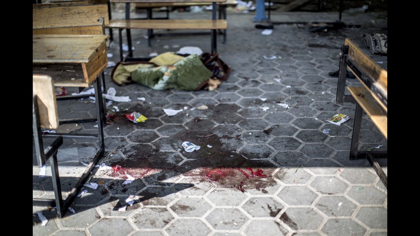 A trail of blood is seen in the courtyard of the school that was hit July 24 in the Beit Hanoun district of Gaza.