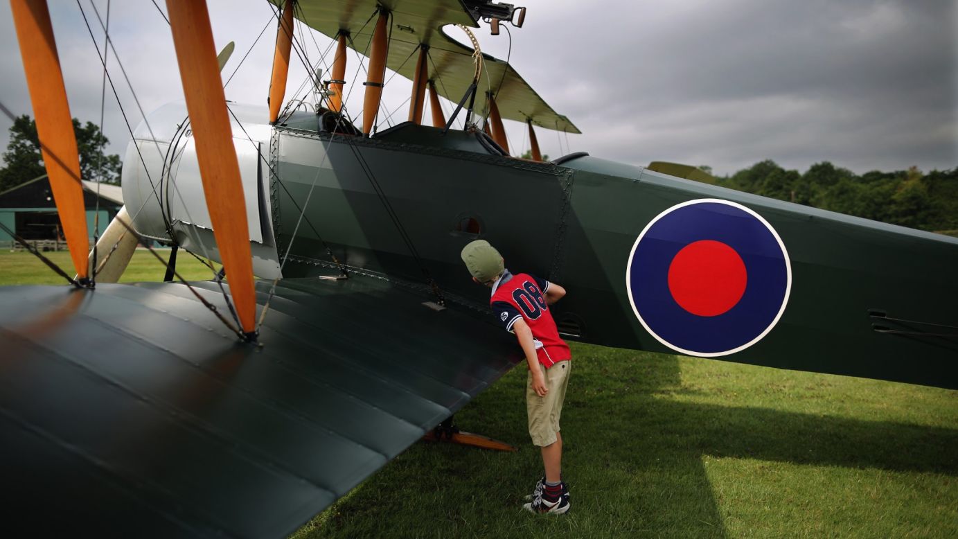 Young aviation enthusiast Patrick Wilson looks at an Avro 504K in Biggleswade, England, on Monday, July 21. The World War I-era plane is part of the <a href="http://www.shuttleworth.org/shuttleworth-collection/shuttleworth-collection.asp" target="_blank" target="_blank">Shuttleworth Collection</a>, a museum known for its classic aircraft.