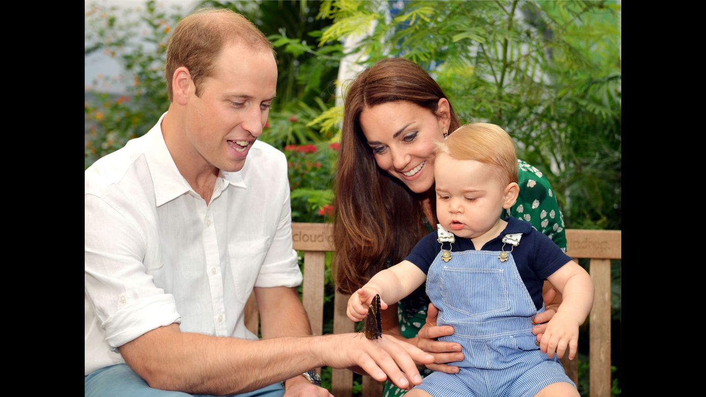 Britain's Prince George and his parents, Prince William and Duchess Catherine, visit a butterfly exhibition at London's Natural History Museum on July 2. The photo was released this week as Prince George <a href="http://www.cnn.com/2014/07/11/world/gallery/prince-george-first-year/index.html">celebrated his first birthday</a> on Tuesday, July 22.