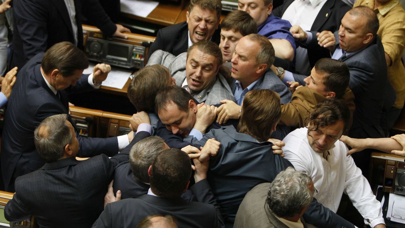 Ukrainian lawmakers tussle during a Parliament session in Kiev, Ukraine, on Tuesday, July 22. According to <a href="http://www.themoscowtimes.com/news/article/ukrainian-politicians-brawl-after-vote-to-send-military-reserves-east/503956.html" target="_blank" target="_blank">The Moscow Times</a>, the brawl came after the narrow approval of a presidential decree that would send more reserve soldiers to fight pro-Russian rebels.