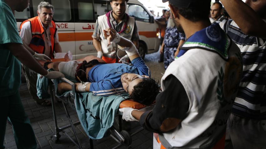A Palestinian wounded in an Israeli strike on a compound housing a UN school in Beit Hanoun, in the northern Gaza Strip.