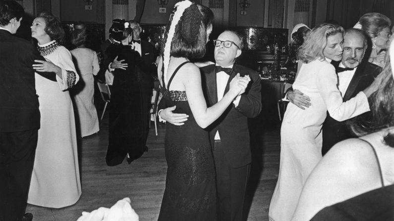 You don't hear much about "society" anymore, but it still mattered in the '60s when Truman Capote (center) mixed socialites and celebrities with his <strong>1966 Black and White Ball</strong>. Held in honor of the Washington Post's Katharine Graham -- pictured on the far left -- it was more of an excuse for a Capote party.  The 500 attendees included Frank Sinatra, CBS founder William Paley, <a href="index.php?page=&url=http%3A%2F%2Fwww.cnn.com%2F2014%2F08%2F12%2Fshowbiz%2Flauren-bacall-dead%2Findex.html">Lauren Bacall</a> -- pictured on the far right dancing with choreographer Jerome Robbins -- three presidential daughters and<a href="index.php?page=&url=http%3A%2F%2Fwww.independent.co.uk%2Fnews%2Fworld%2Famericas%2Fthe-inside-story-of-truman-capotes-masked-ball-475551.html" target="_blank" target="_blank"> Capote's elevator man</a>. It was both a throwback to the swell soirees of the past and a precursor to the media-mad, celebrity-studded bashes of today.