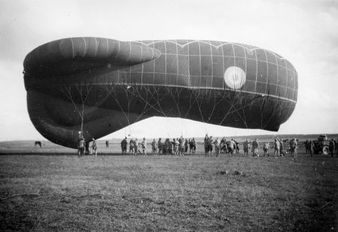 ... and this not-very-subtle sausage-shaped observation balloon in France on November 10, 1918. The balloons were used for, among other things, artillery spotting.  Because they were filled with flammable hydrogen, they were well-guarded by anti-aircraft artillery.
