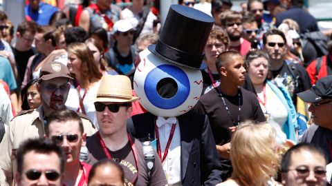 Costumed fans attend Comic-Con on July 24. 