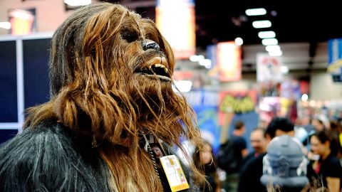 Christopher Petrone towers over fellow attendees in his handmade Chewbacca costume.