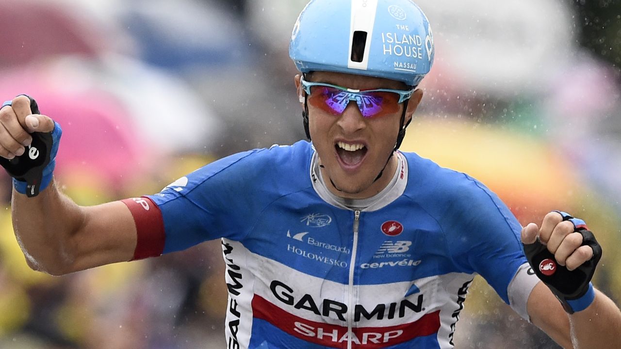 Ramunas Navardauskas celebrates his historic victory on the 19th stage of the Tour de France in Bergerac.