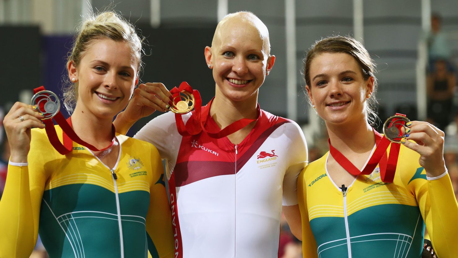 Joanna Rowsell is flanked by Australian duo Annette Edmonson and Amy Cure (right) after the medal presentation for the women's individual pursuit.