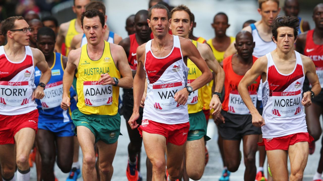 Steve Way leads in the Commonwealth Games marathon with the favorites massing behind him.