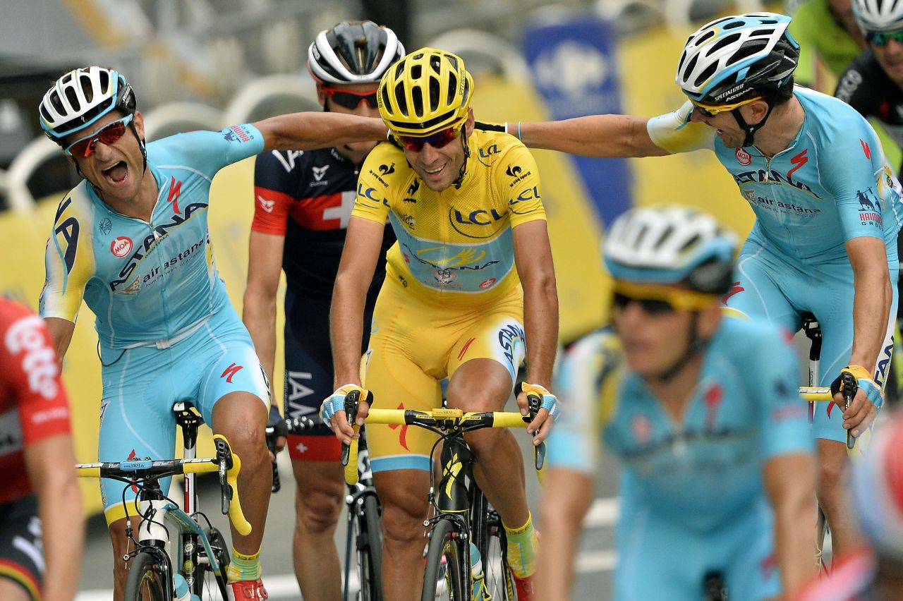 Nibali is congratulated by his Astana teammates after completing his yellow jersey triumph on the Tour de France.