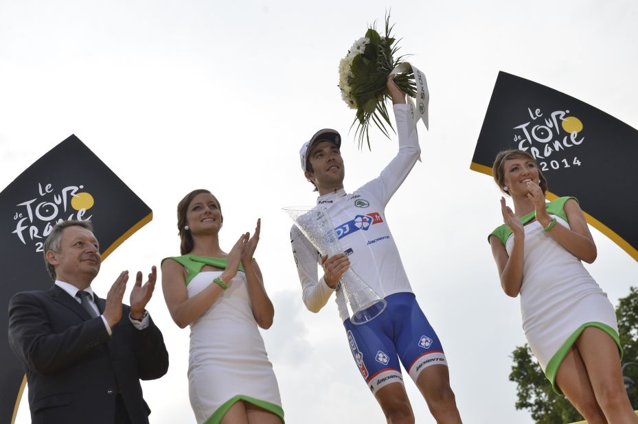 Thibaut Pinot is crowned best young rider on the 2014 Tour de France and receives the white jersey on the podium in Paris. 