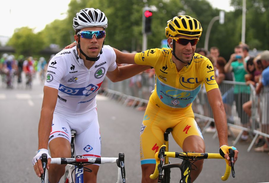 Pinot and yellow jersey winner Nibali share a moment during the 21st and final stage of the Tour de France. 