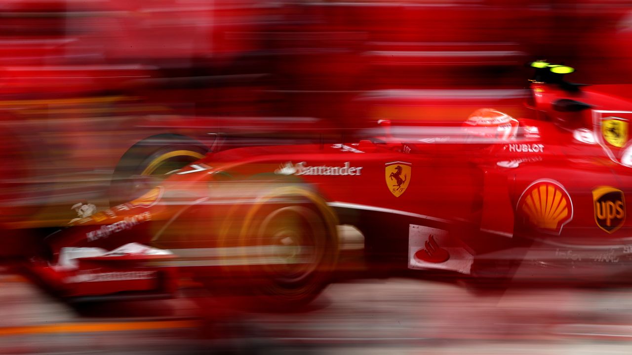 A slow shutter speed was used to snap this photo of Formula One driver Kimi Raikkonen as he made a pit stop Sunday, July 27, during the Hungarian Grand Prix in Budapest, Hungary. Raikkonen finished sixth in the race, which was won by Daniel Ricciardo.