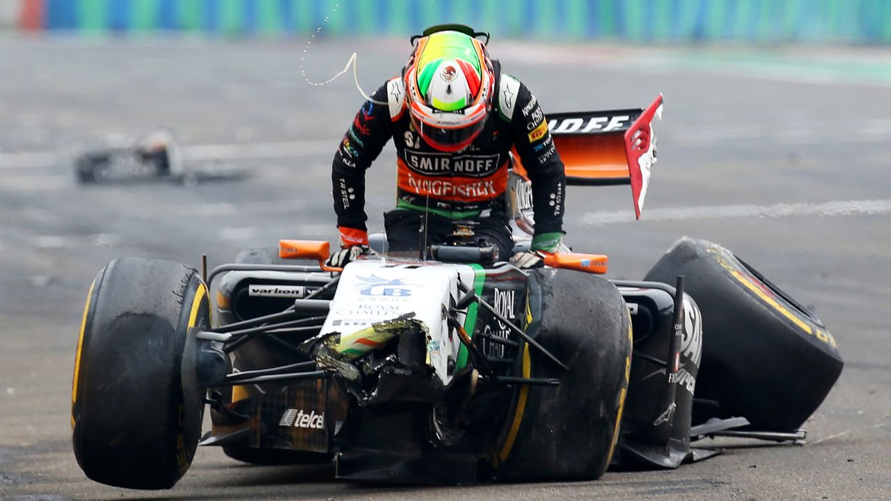Formula One driver Sergio Perez gets out of his car after crashing during the Hungarian Grand Prix held Sunday, July 27, in Budapest, Hungary.