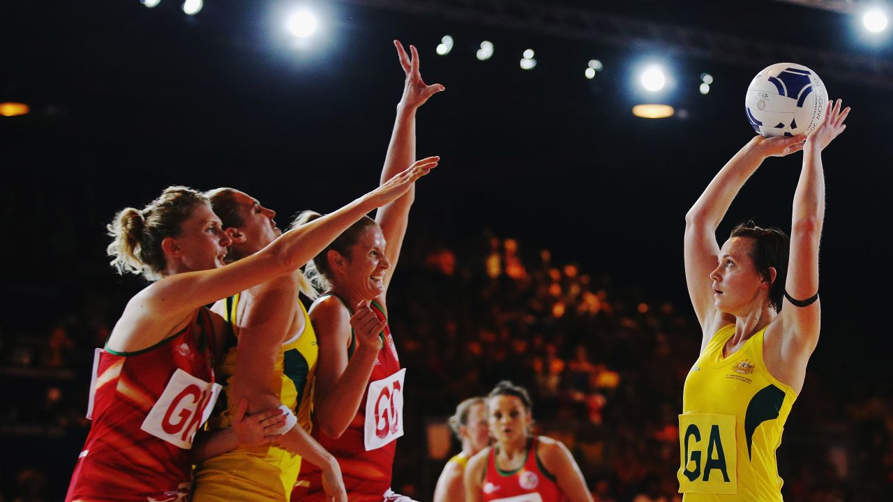 Australian netball player Natalie Medhurst shoots during a preliminary round game against Wales on Thursday, July 24, during the Commonwealth Games in Glasgow, Scotland. Australia won 63-36.