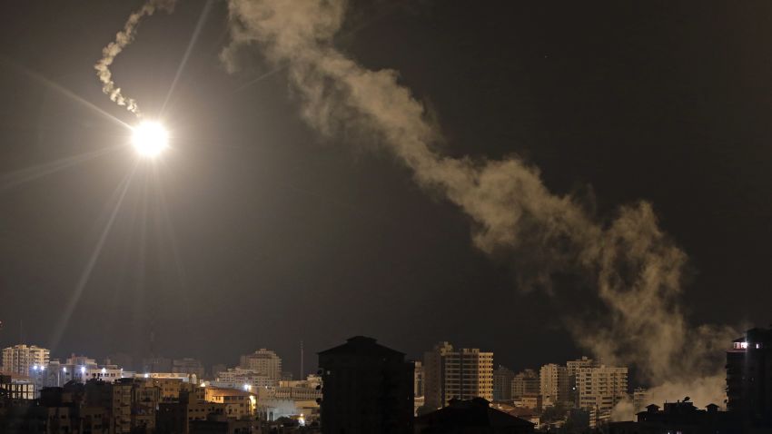 Israeli forces' flares light up the night sky  of Gaza City on early Tuesday, July 29, 2014. A truce between Israel and Hamas militants in Gaza remained elusive as diplomats sought to end the fighting at the start of the Eid al-Fitr holiday, marking the end of the Muslim holy month of Ramadan.
