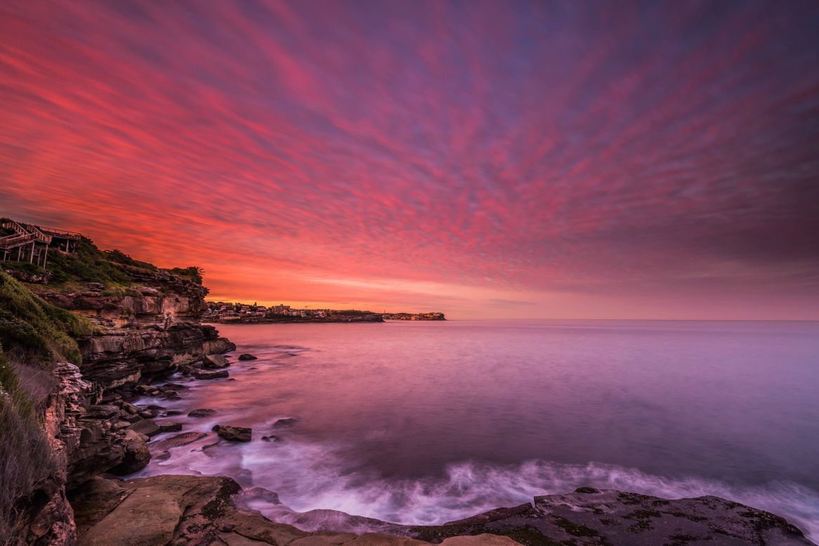 Though no stranger to pretty sunsets, Sydneysiders went particularly click-happy over this one. <a href="http://www.mcinnesphotography.com.au" target="_blank" target="_blank">Keith McInnes</a> captured the violet hues reflected in the water.
