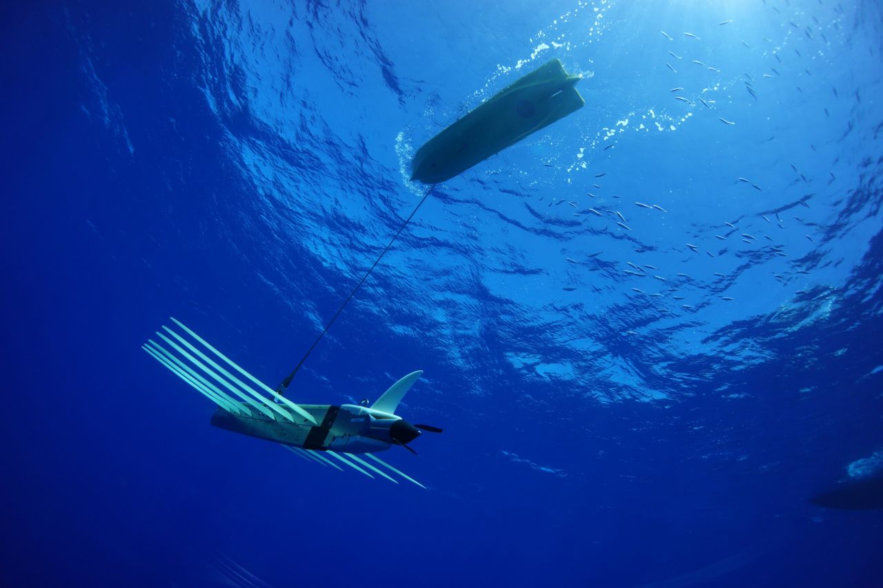 The Wave Glider SV3 from Liquid Robotics. The craft's hybrid propulsion system utilizes solar panels above and wave power below. 
