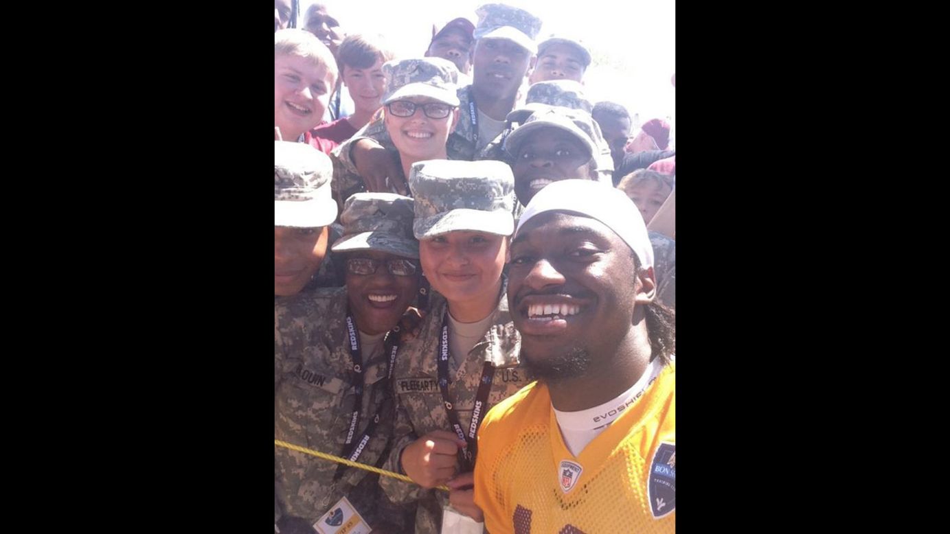 Washington Redskins quarterback Robert Griffin III <a href="https://twitter.com/RGIII/status/492723451325460481" target="_blank" target="_blank">tweeted a selfie</a> he took with fans at training camp on Friday, July 25. "Selfie w/ the Best fans in the world baby!" he wrote. "Love y'all & thank y'all for coming out every day to support us." The Redskins are training in Richmond, Virginia, for the upcoming NFL season.