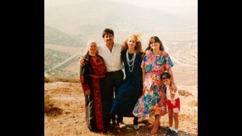 Naim Naif was born in the U.S. but spent part of his childhood in the West Bank. His <a href="http://ireport.cnn.com/docs/DOC-1156751">Palestinian parents</a>, seen in the center, posed after getting engaged in 1985 in his father's hometown Sinjil, West Bank. Click through to see photos of his family through the years.