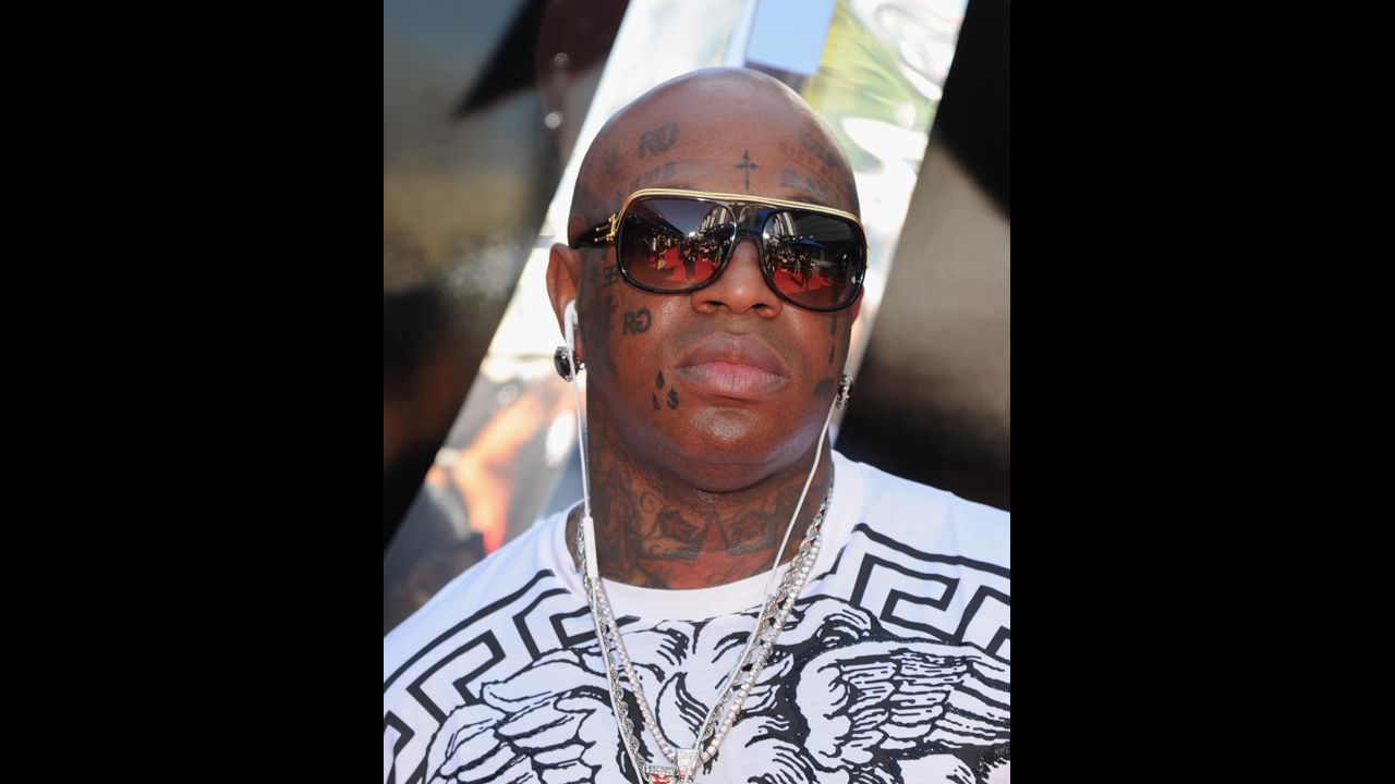 Rapper Birdman has tattoos on his face, arms and legs including religious symbols, names and even one of his record management company, Rich Gang. 