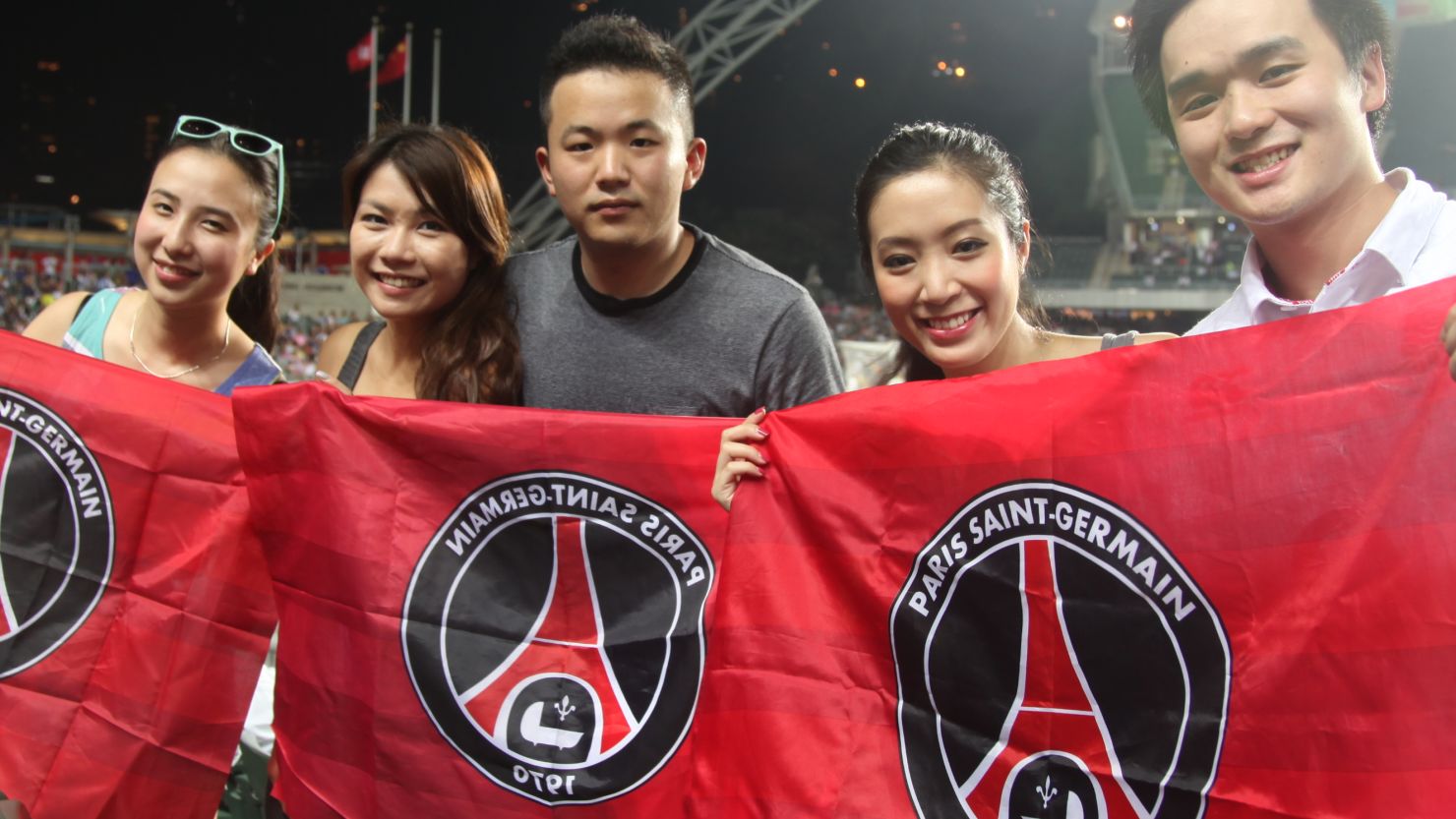 PSG fans welcome their team to Hong Kong Stadium for a friendly match against local champion Kitchee.