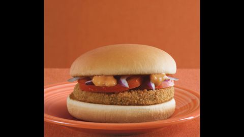 McDonald's restaurants around the world adapt local dishes to the regular menu of Big Macs and fries. The McAloo Tikki sandwich, at McDonald's India, appeals to the country's large vegetarian population with a potato and peas patty, onions and tomatoes, and special spices.
