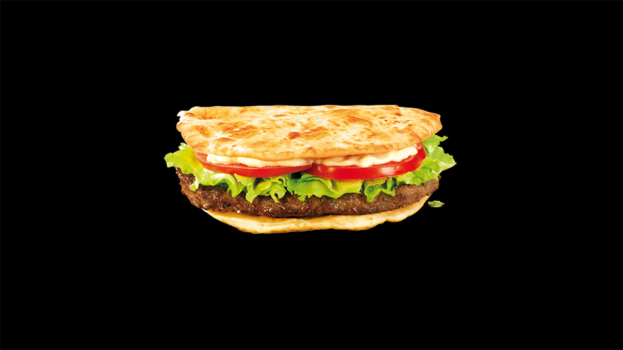 This ground beef sandwich with onions, cumin, and coriander is marketed as the McArabia sandwich in Morocco. According to McDonald's Morocco, it contains "a thousand and one flavors" that "wake up our taste buds."